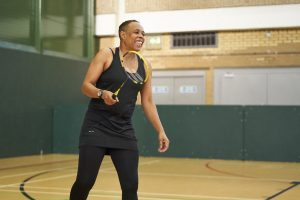 Woman playing badminton