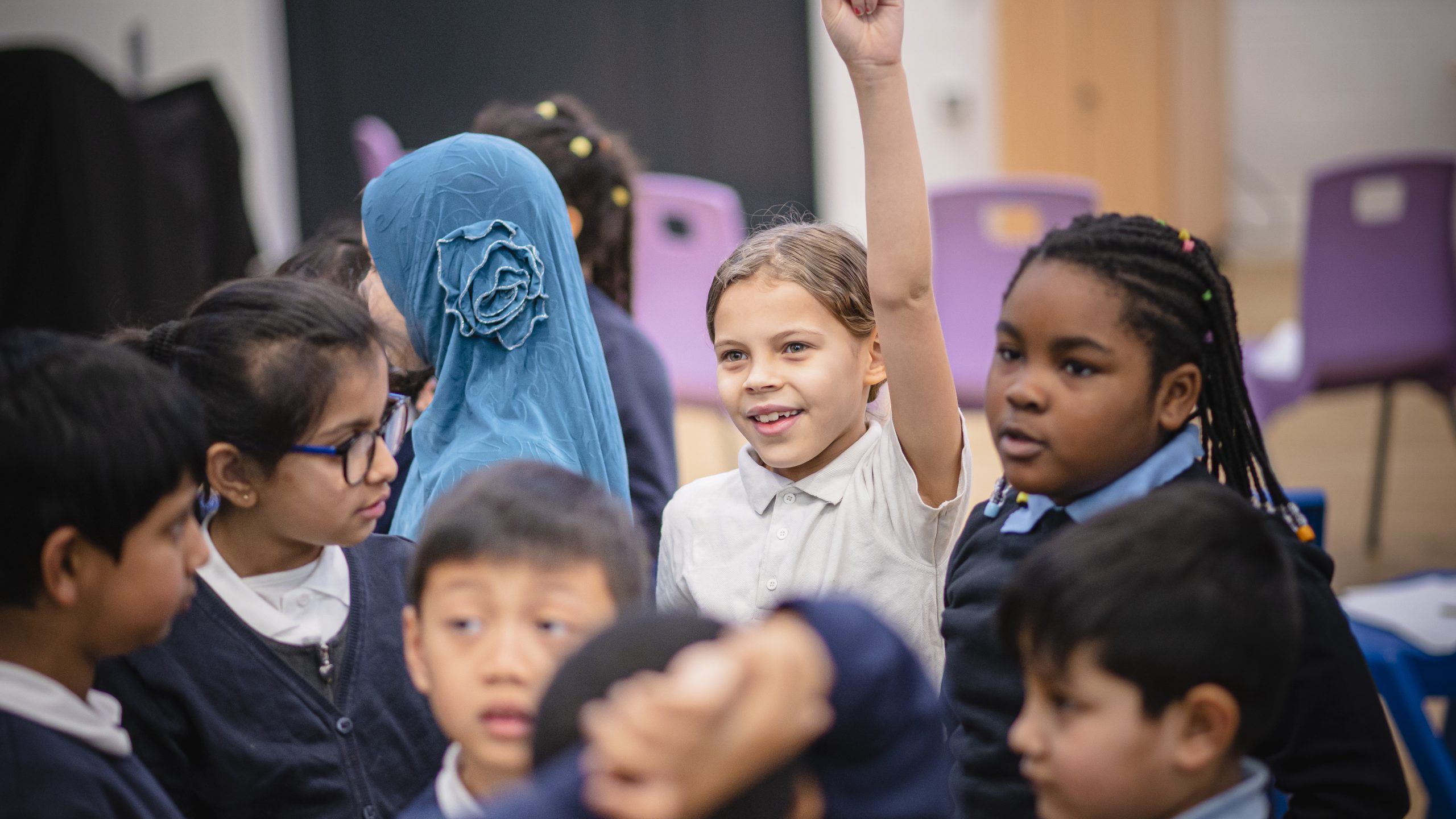 A group of primary school children from different backgrounds