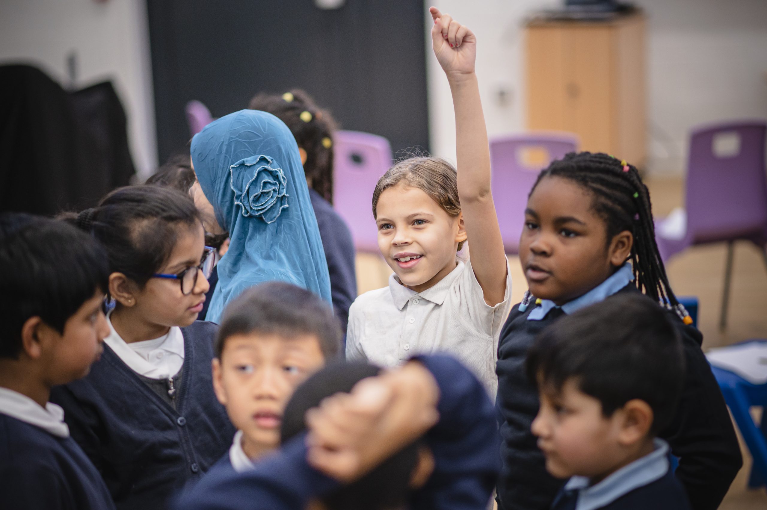 A group of primary school children from different backgrounds