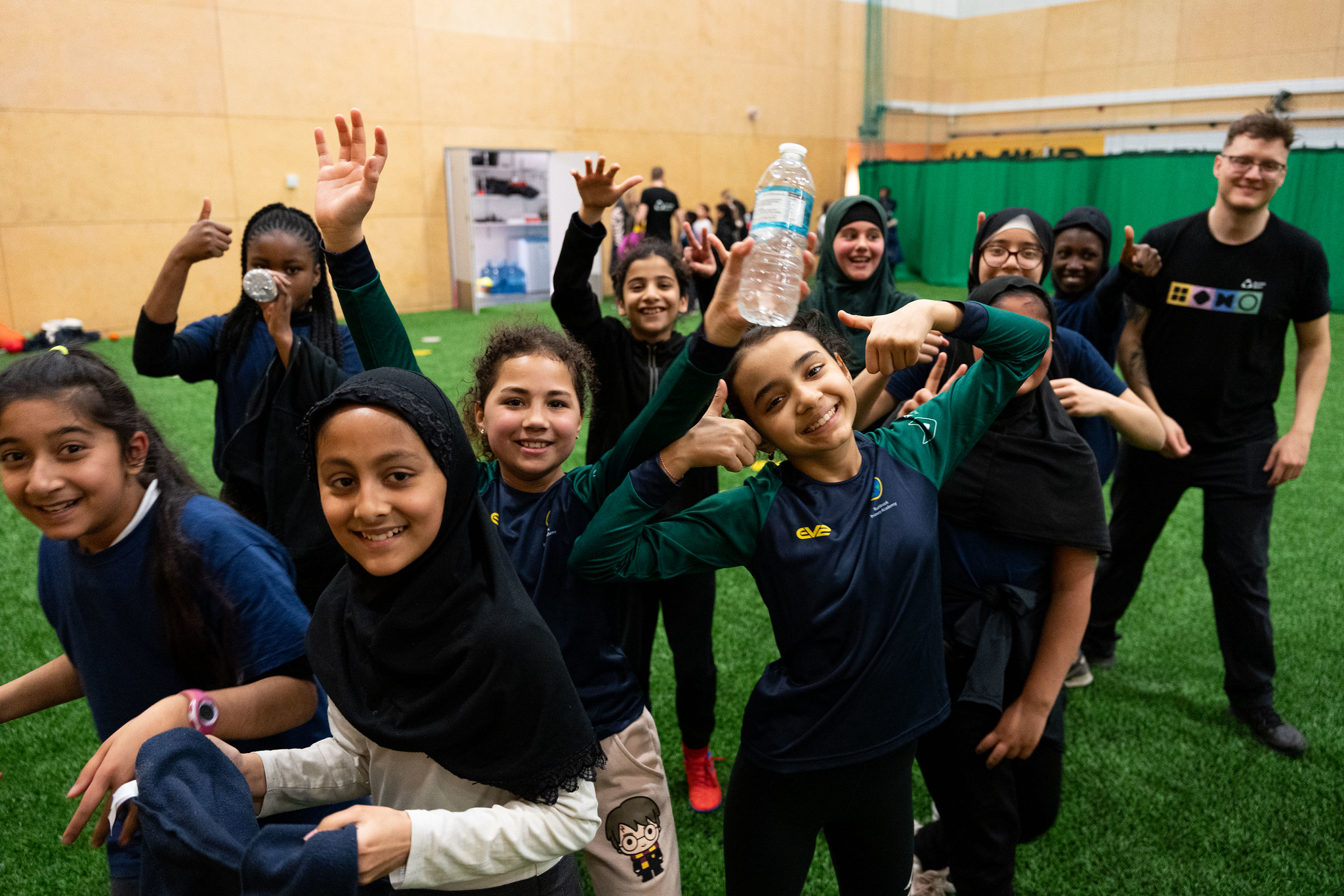 A group of teenage girls smiling