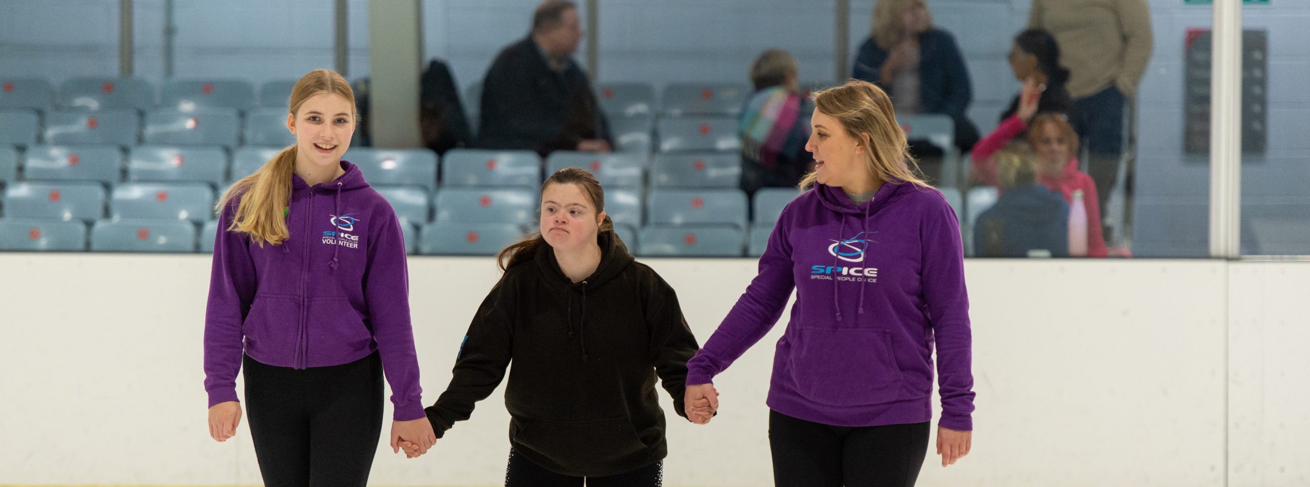 A disabled teenage girl iceskating