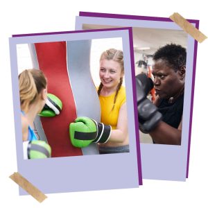 A mum and daughter practicing boxing hits together