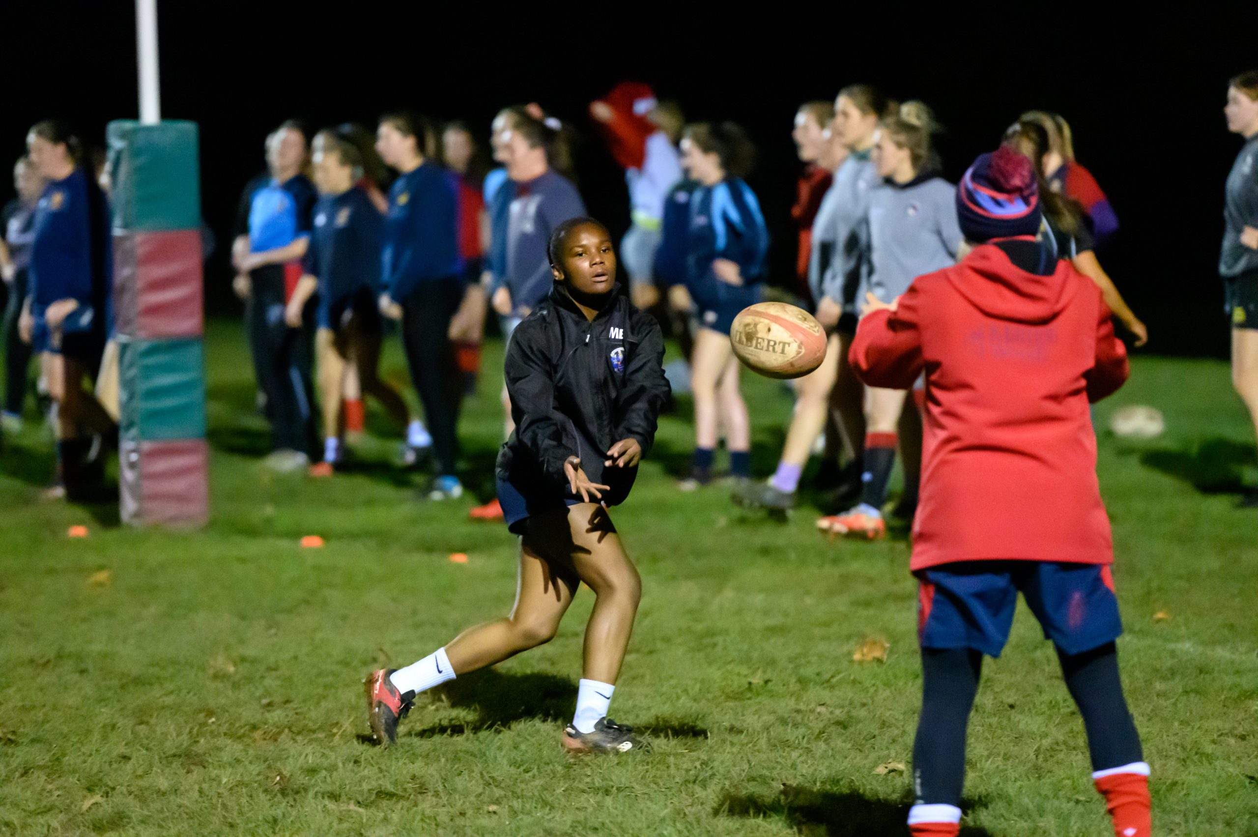 Girls playing rugby